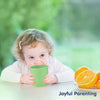 "Spill-proof silicone baby cup – easy-to-hold training cup for infants"