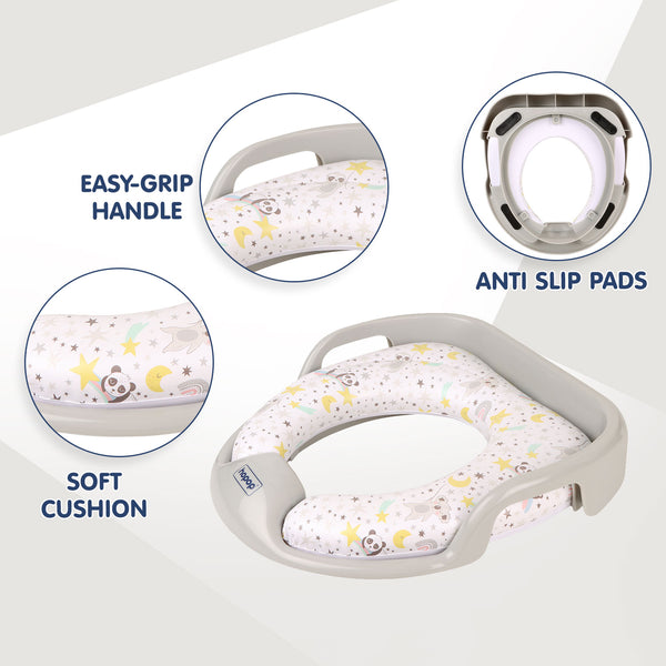 Cushioned baby potty seat with handles on toilet